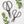 Load image into Gallery viewer, Two pairs of vintage-inspired black metal scissors with high-carbon steel blades, displayed on a white surface surrounded by green leaves.