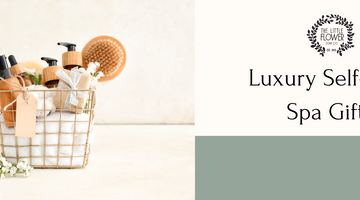 Light and Airy bathroom modern vintage Nancy Meyers bathroom decor header for a blog post about luxury spa gifts and baskets to pamper women with home spa day or self care gift.  Bath goods