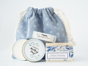 Small handmade mother's day gift idea affordable spa gift set with candle lip balm and soap in drawstring bag lavender bath and body gifts for mom