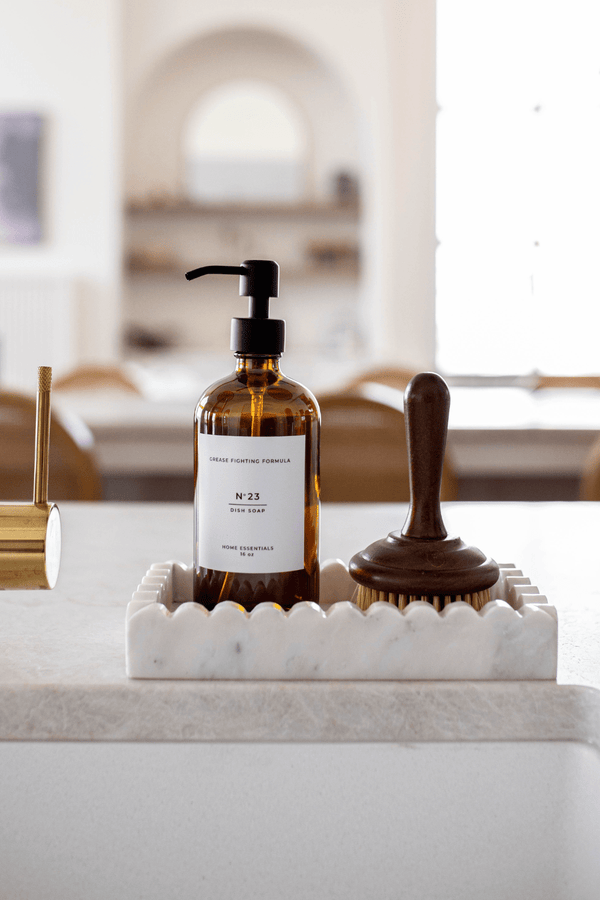 Kitchen counter with dish brush and soap elegant upscale wood luxe b. dish brush in white scalopped marble tray