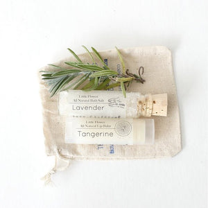 Mini spa gift set with lip balm and lavender foot soak vial in natural muslin drawstring pouch